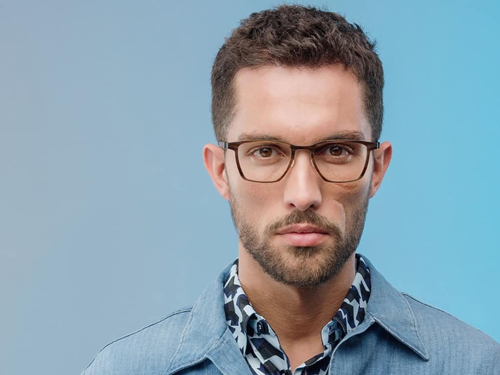 male-model-with-glases-baby-blue-background